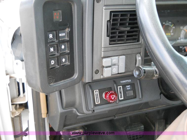 image for item 5061 1999 GMC C7500 bucket truck