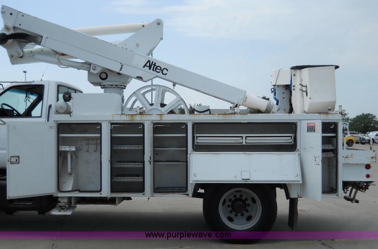 image for item 5061 1999 GMC C7500 bucket truck