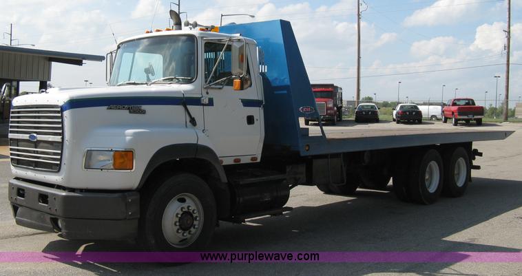 image for item 5104 1994 Ford LTA9000 Aero Max 106 truck with 28' roll back bed