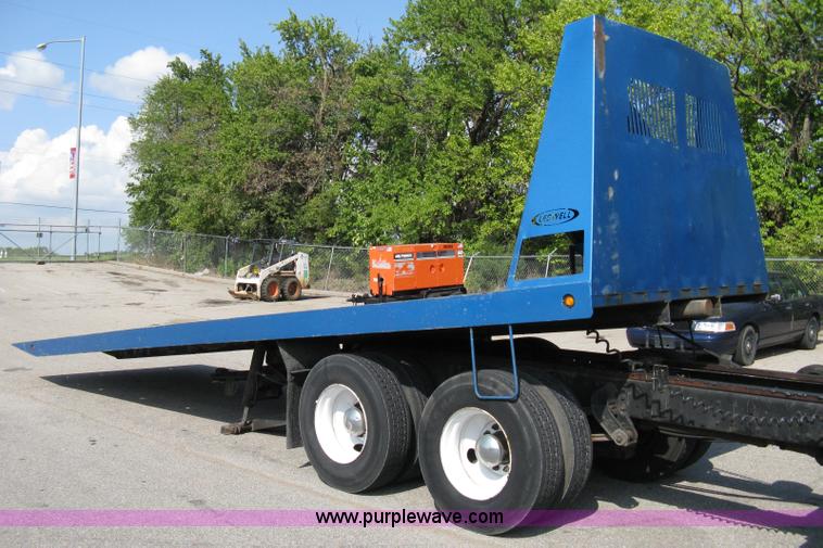 image for item 5104 1994 Ford LTA9000 Aero Max 106 truck with 28' roll back bed