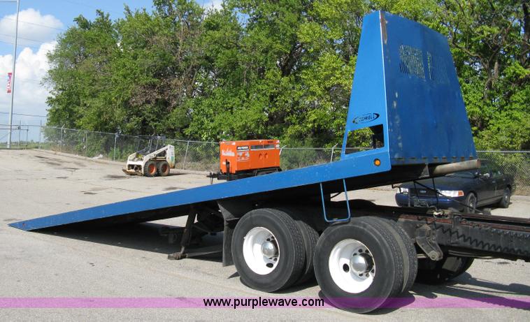 image for item 5104 1994 Ford LTA9000 Aero Max 106 truck with 28' roll back bed
