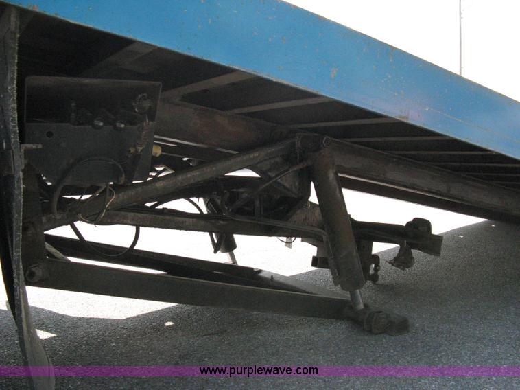 image for item 5104 1994 Ford LTA9000 Aero Max 106 truck with 28' roll back bed