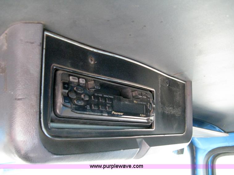 image for item 5104 1994 Ford LTA9000 Aero Max 106 truck with 28' roll back bed