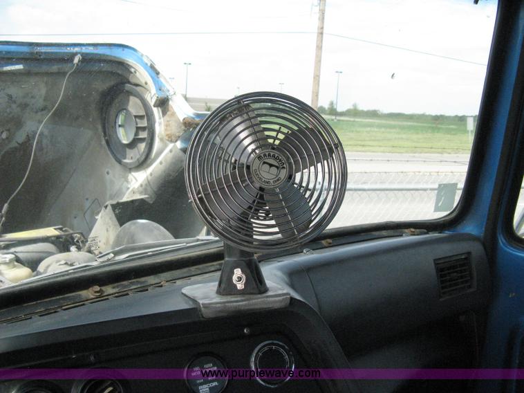 image for item 5104 1994 Ford LTA9000 Aero Max 106 truck with 28' roll back bed