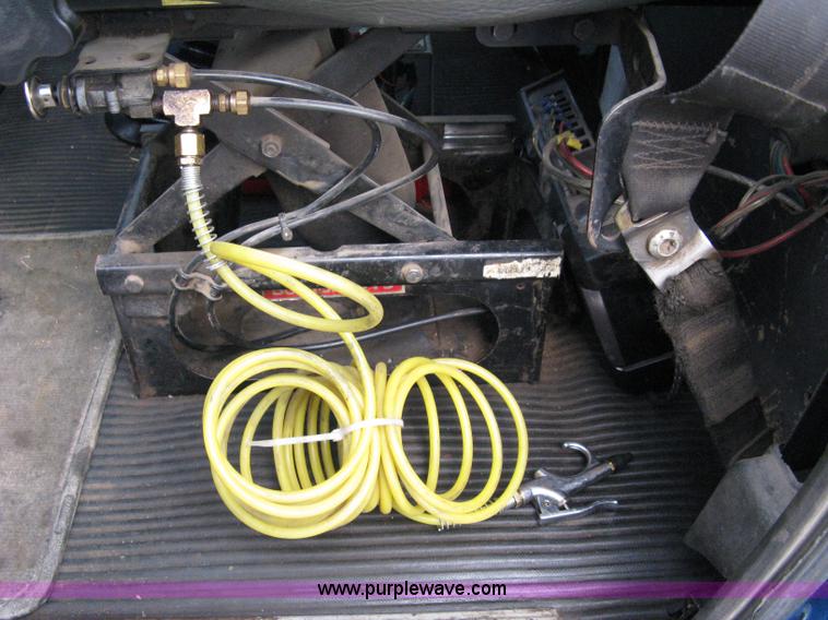 image for item 5104 1994 Ford LTA9000 Aero Max 106 truck with 28' roll back bed