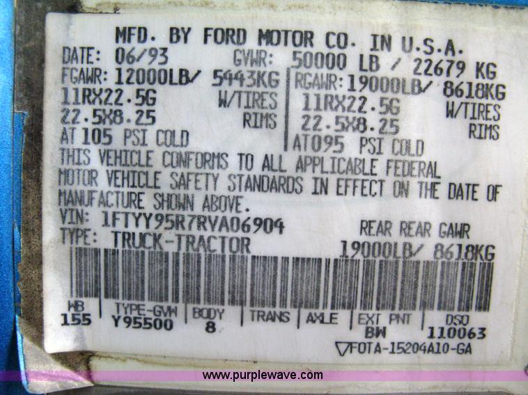 image for item 5104 1994 Ford LTA9000 Aero Max 106 truck with 28' roll back bed