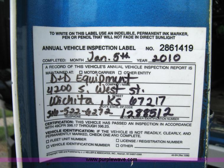 image for item 5104 1994 Ford LTA9000 Aero Max 106 truck with 28' roll back bed