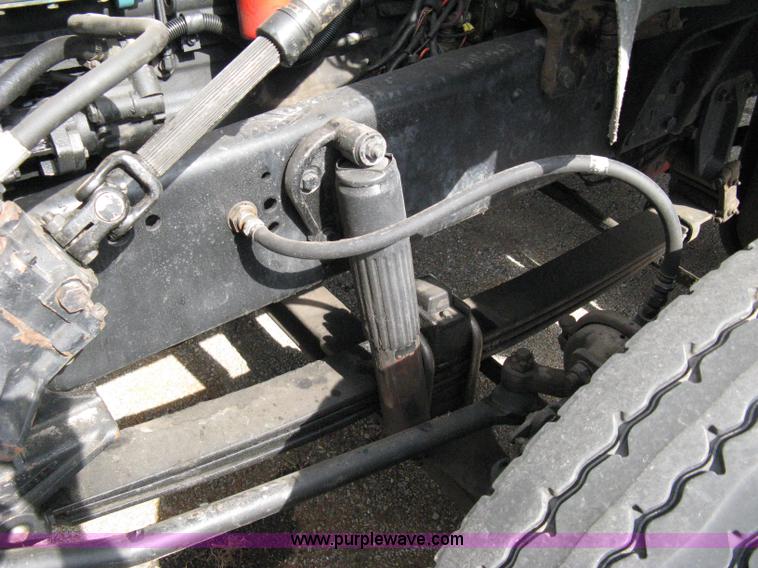 image for item 5104 1994 Ford LTA9000 Aero Max 106 truck with 28' roll back bed