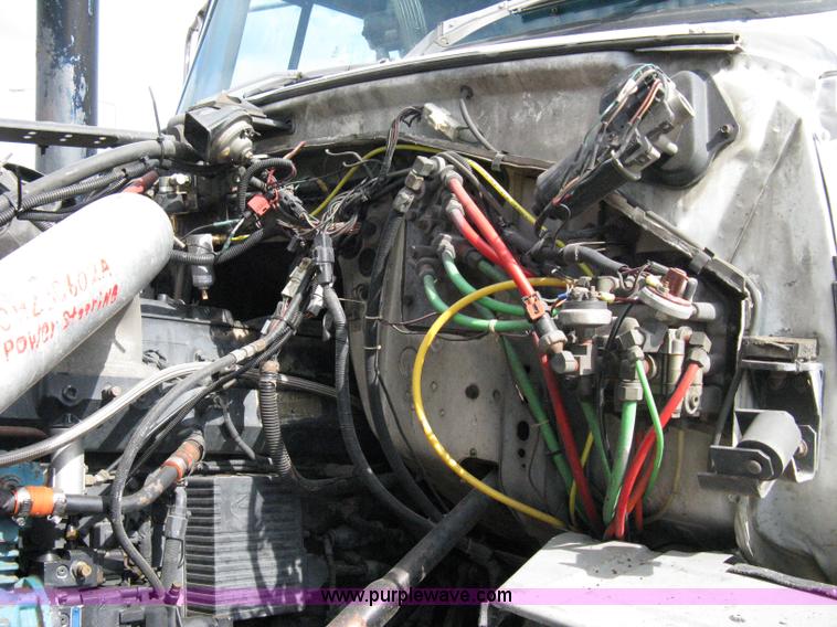 image for item 5104 1994 Ford LTA9000 Aero Max 106 truck with 28' roll back bed