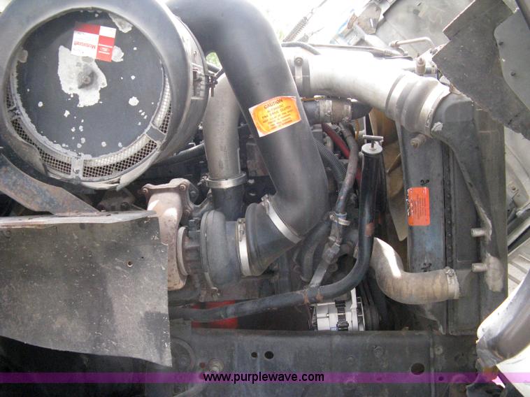 image for item 5104 1994 Ford LTA9000 Aero Max 106 truck with 28' roll back bed