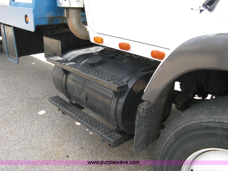 image for item 5104 1994 Ford LTA9000 Aero Max 106 truck with 28' roll back bed