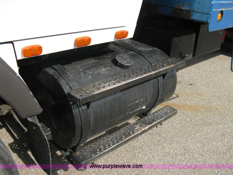 image for item 5104 1994 Ford LTA9000 Aero Max 106 truck with 28' roll back bed