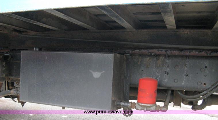 image for item 5104 1994 Ford LTA9000 Aero Max 106 truck with 28' roll back bed