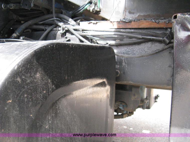 image for item 5104 1994 Ford LTA9000 Aero Max 106 truck with 28' roll back bed