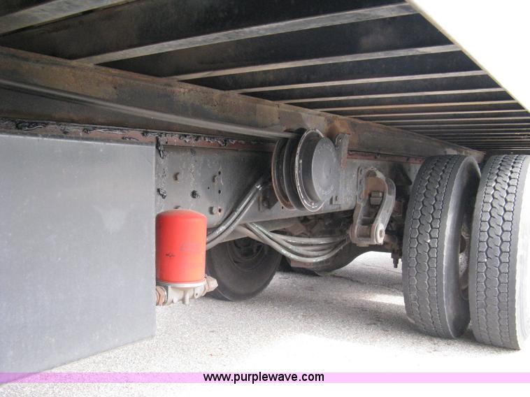 image for item 5104 1994 Ford LTA9000 Aero Max 106 truck with 28' roll back bed