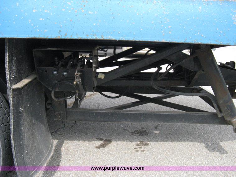 image for item 5104 1994 Ford LTA9000 Aero Max 106 truck with 28' roll back bed