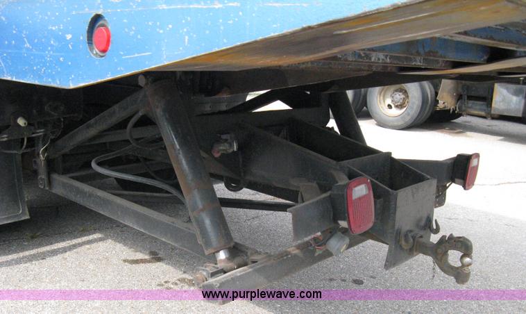 image for item 5104 1994 Ford LTA9000 Aero Max 106 truck with 28' roll back bed