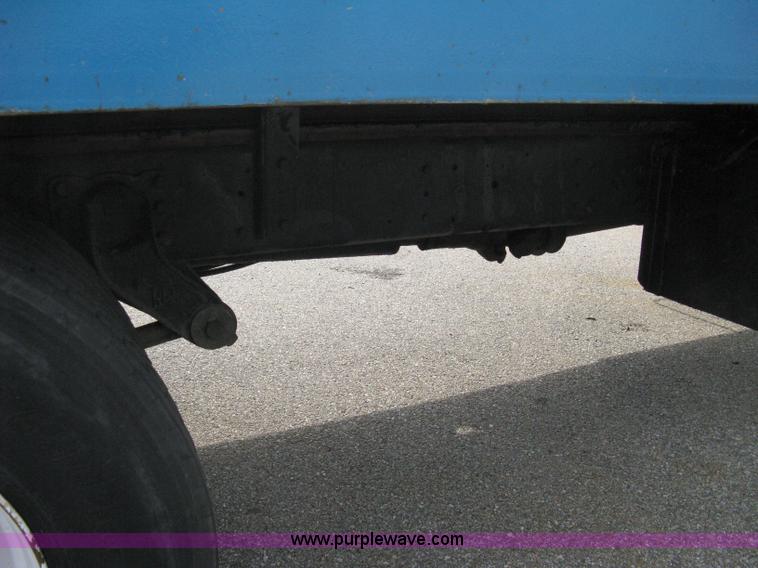 image for item 5104 1994 Ford LTA9000 Aero Max 106 truck with 28' roll back bed