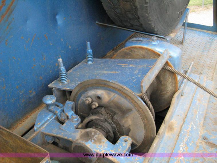 image for item 5104 1994 Ford LTA9000 Aero Max 106 truck with 28' roll back bed