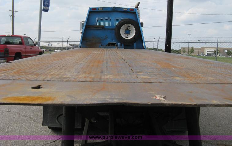 image for item 5104 1994 Ford LTA9000 Aero Max 106 truck with 28' roll back bed