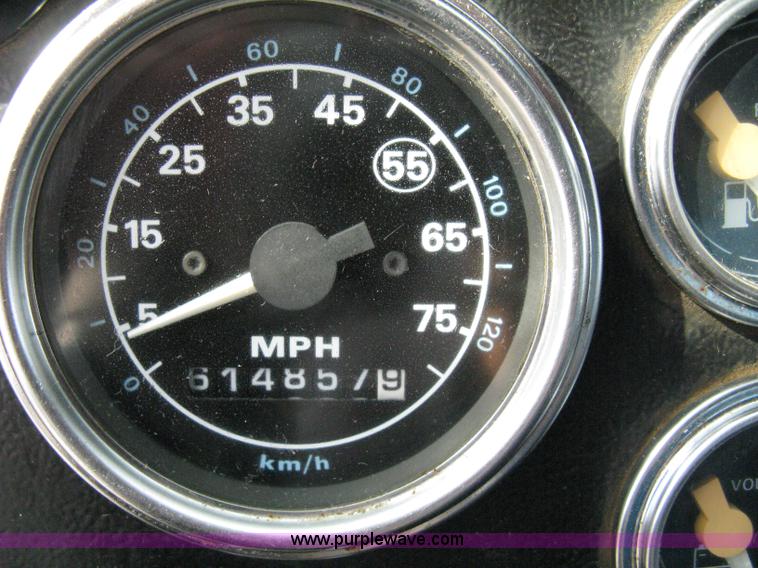 image for item 5104 1994 Ford LTA9000 Aero Max 106 truck with 28' roll back bed