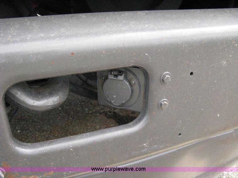 image for item 5104 1994 Ford LTA9000 Aero Max 106 truck with 28' roll back bed