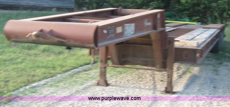 image for item 5566 1981 Bush Hog Landcraft 32' flatbed trailer