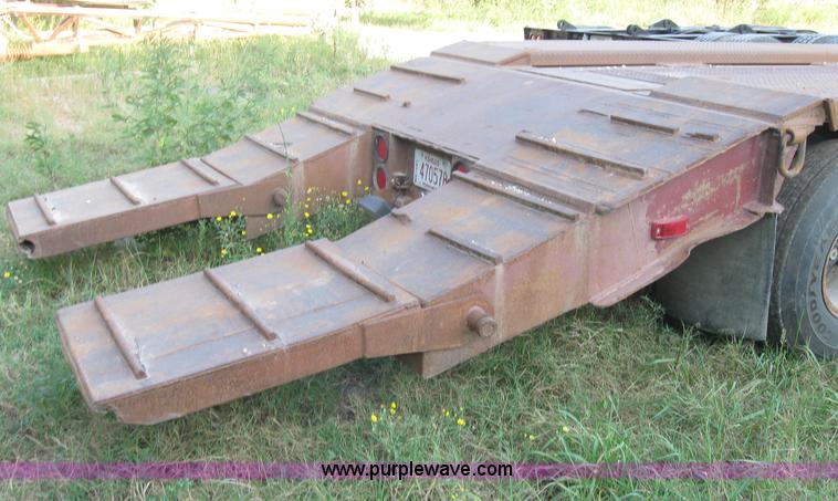image for item 5566 1981 Bush Hog Landcraft 32' flatbed trailer
