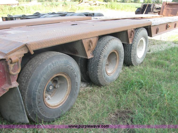 image for item 5566 1981 Bush Hog Landcraft 32' flatbed trailer