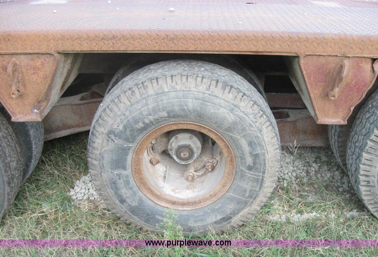 image for item 5566 1981 Bush Hog Landcraft 32' flatbed trailer