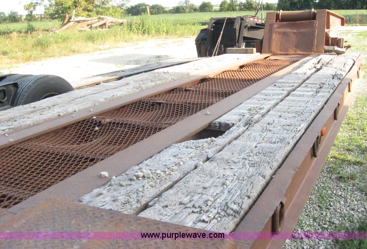 image for item 5566 1981 Bush Hog Landcraft 32' flatbed trailer