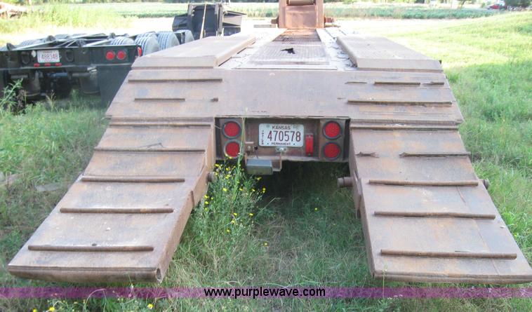 image for item 5566 1981 Bush Hog Landcraft 32' flatbed trailer