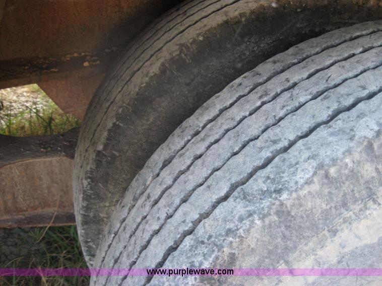 image for item 5566 1981 Bush Hog Landcraft 32' flatbed trailer