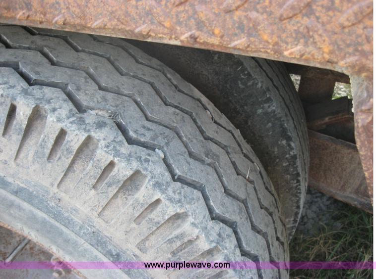 image for item 5566 1981 Bush Hog Landcraft 32' flatbed trailer