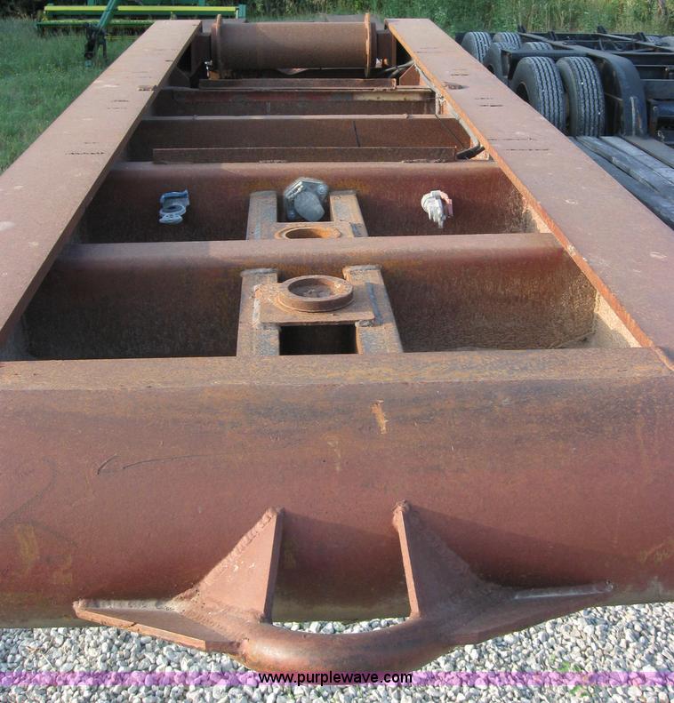 image for item 5566 1981 Bush Hog Landcraft 32' flatbed trailer