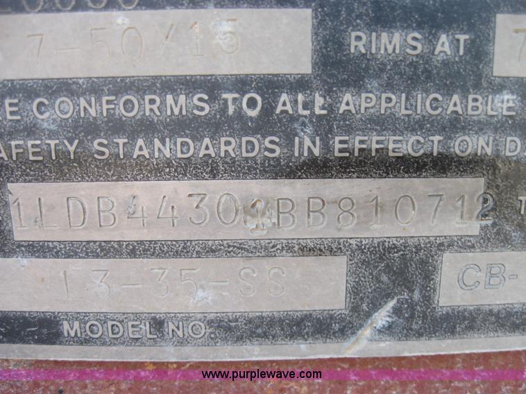 image for item 5566 1981 Bush Hog Landcraft 32' flatbed trailer