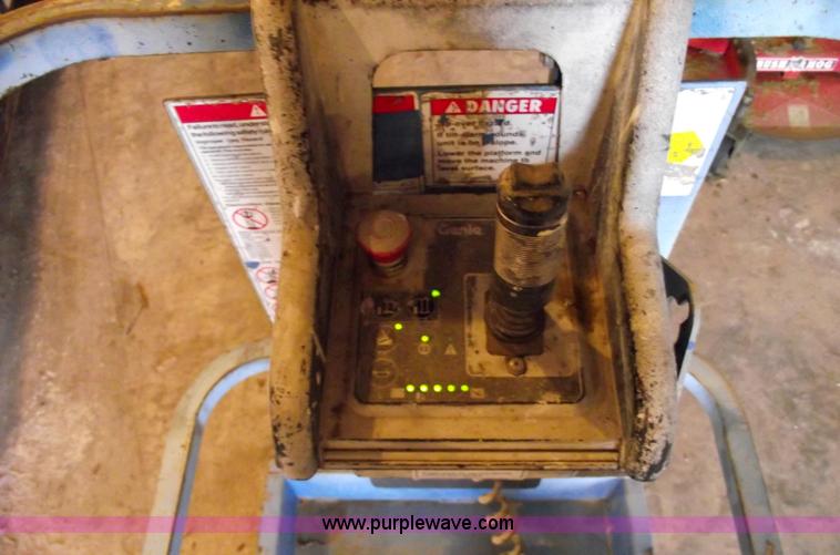 image for item 5843 2004 Genie GS-2632 scissor lift