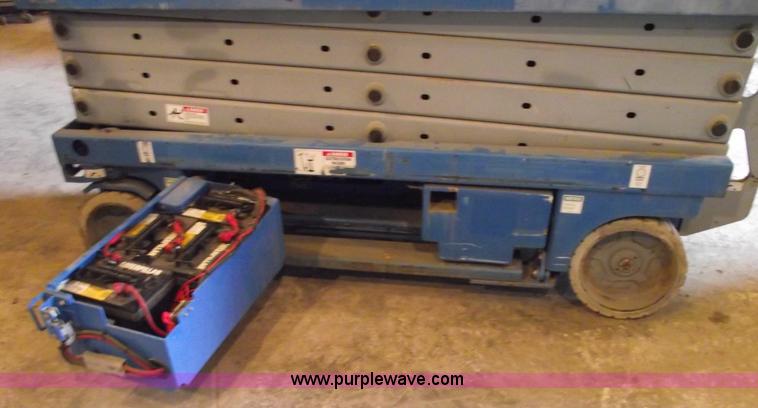 image for item 5843 2004 Genie GS-2632 scissor lift