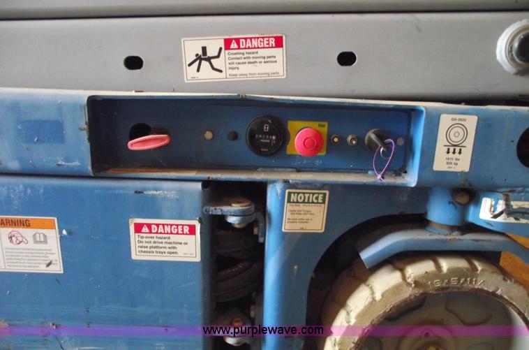 image for item 5843 2004 Genie GS-2632 scissor lift