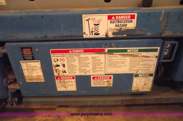 image for item 5843 2004 Genie GS-2632 scissor lift