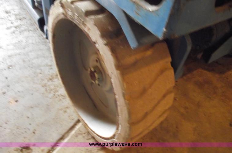 image for item 5843 2004 Genie GS-2632 scissor lift