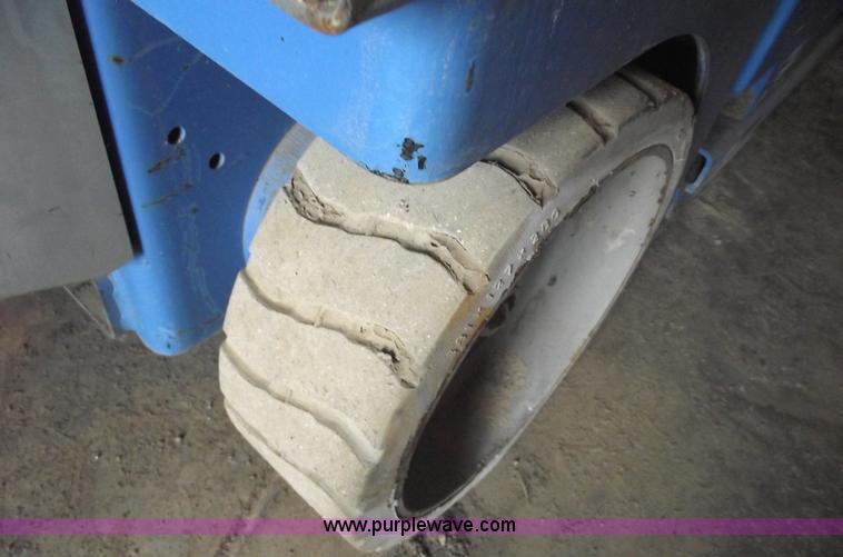 image for item 5843 2004 Genie GS-2632 scissor lift