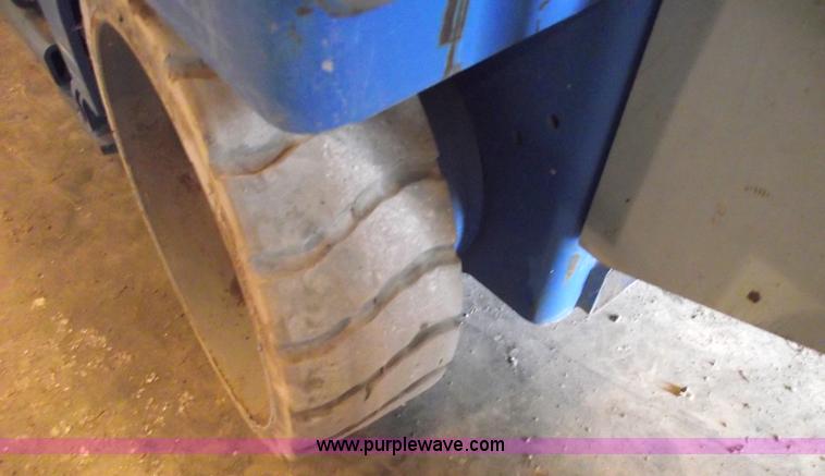 image for item 5843 2004 Genie GS-2632 scissor lift