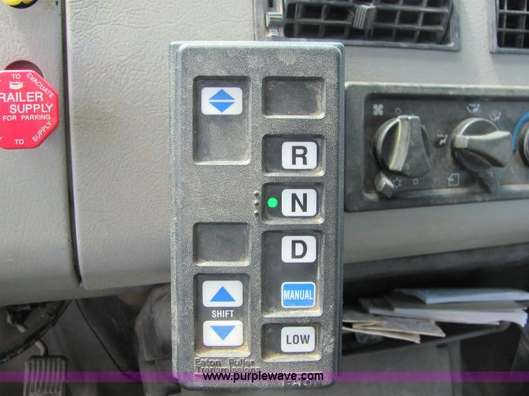 image for item 6957 2002 Freightliner FL80 single axle dump truck