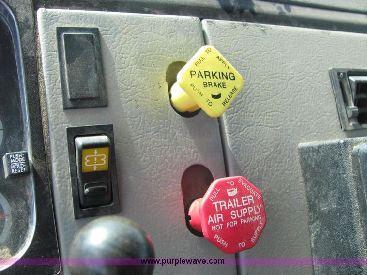 image for item 6957 2002 Freightliner FL80 single axle dump truck