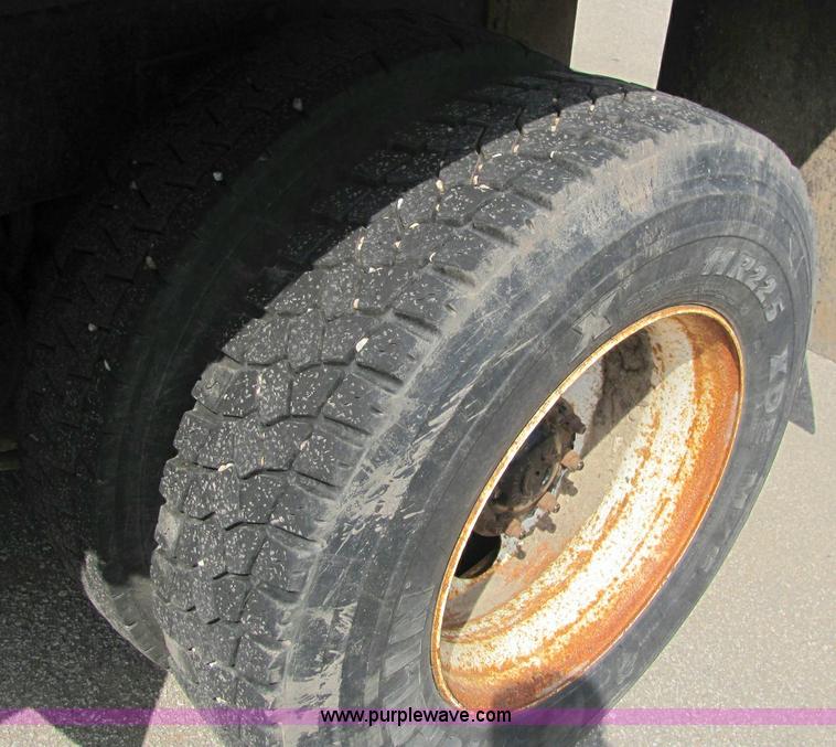 image for item 6957 2002 Freightliner FL80 single axle dump truck