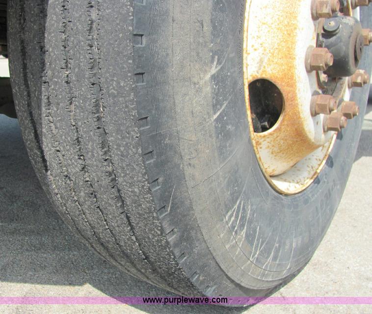 image for item 6957 2002 Freightliner FL80 single axle dump truck