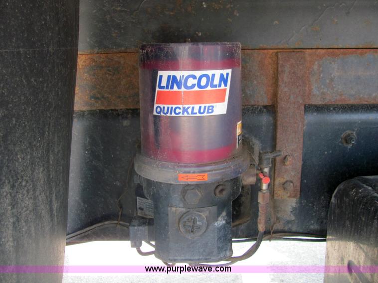 image for item 6957 2002 Freightliner FL80 single axle dump truck