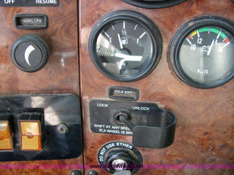 image for item 6958 2001 Peterbilt Conventional 330 tandem axle dump truck