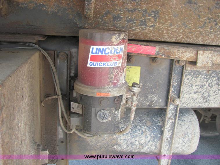 image for item 6958 2001 Peterbilt Conventional 330 tandem axle dump truck